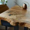 Wooden tables that make your office interior stand out